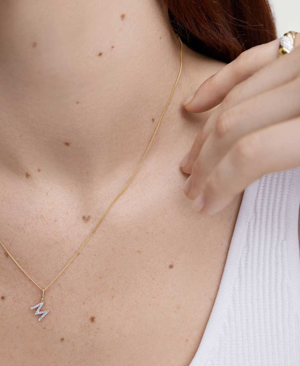 Pendentif lettre en diamants